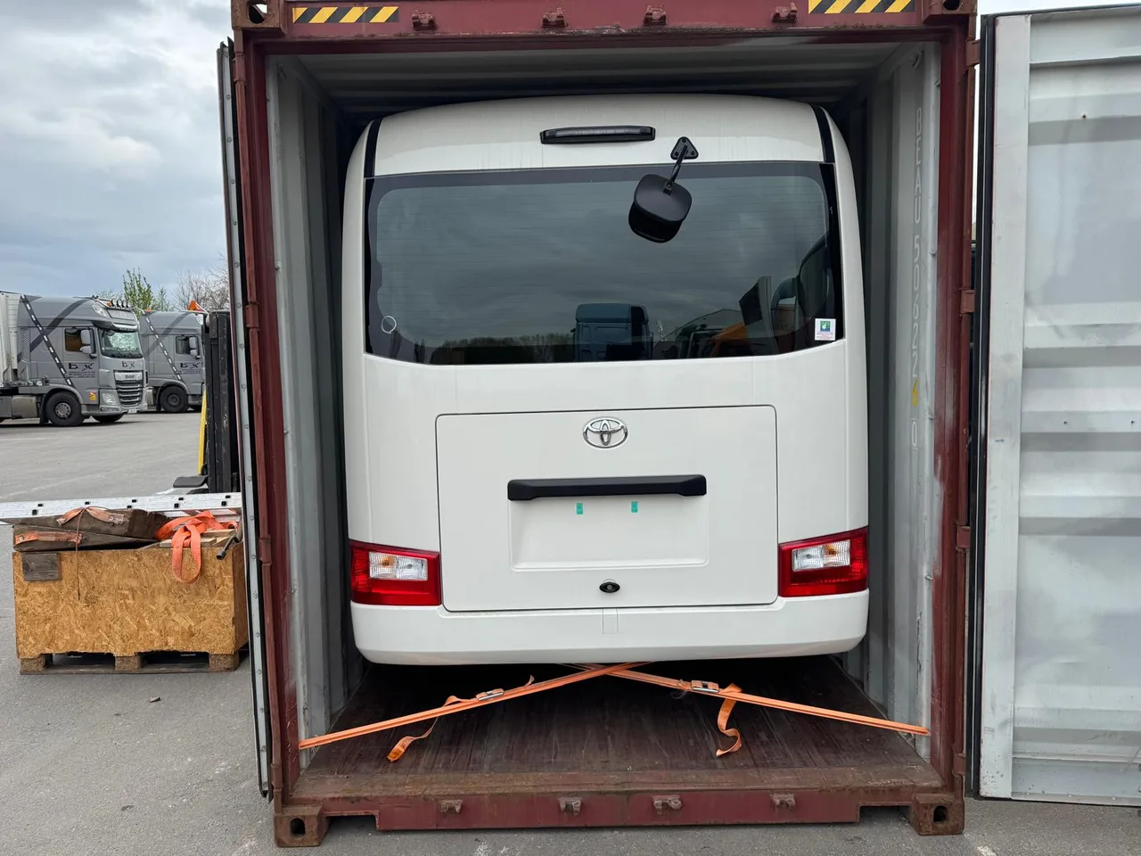 Vehicle being prepared for container shipping in Antwerp